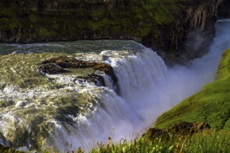 Gullfoss Golden Falls - the most beautiful waterfall in Iceland, on the Hvita River. Above the