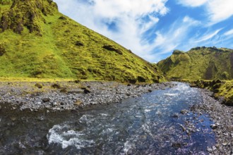 The canyon Pakgil fast flowing shallow stream. Scenic summer Iceland. The photo was taken Fisheye
