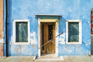 Bright blue color house in Burano, Venice