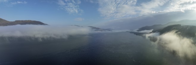 Morning fog over Loch Linnhe at the narrows near Ardgour, drone image, Western Highlands, Scotland,