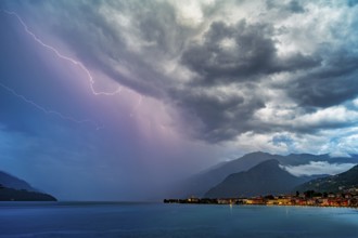 A strong thunderstorm with lots of lightning over Lake Como