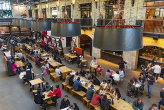 People enjoying food in The Forks Market in Winnipeg, Canada