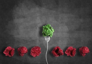 Inspiration concept with crumpled paper light bulb as good idea