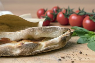Pinsa romana and scrocchiarella gourmet italian cuisine. Traditional dish in italy