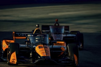 As the sun starts to set, NTT INDYCAR SERIES driver, PATO OWARD (5) (MEX) of Monterey, Mexico races