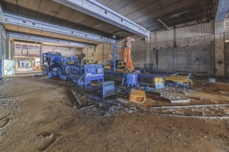 Abandoned industrial hall with decommissioned machinery and production facilities, Metallwerke