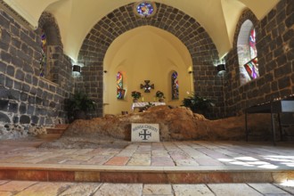 One of the most ancient churches on Sea of Galilee. A stone laying from black stones and an altar