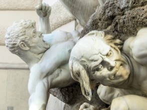Sculptures on the façade of a townhouse in Vienna Austria