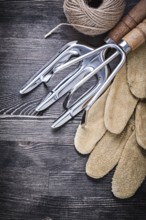 Trowel fork rake leather gloves hank of string agriculture concept