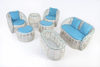 Suite of wicker furniture made of synthetic fibre on isolated background