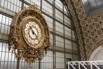 PARIS, FRANCE, MAY 29, 2022, Ornate clock at the main hall of famous museum d'Orsay in Paris,