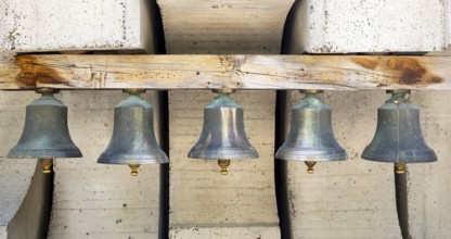 Many old bells - campanes are seen in a row