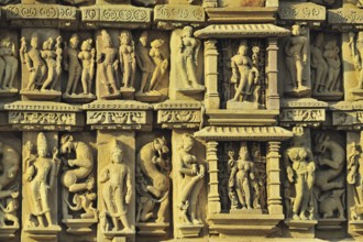 Intricately carved wall of parsvanatha temple Khajuraho madhya pradesh india