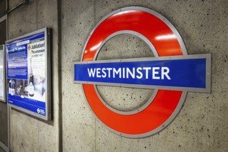 Westminster station roundel in the London Underground, showcasing classic subway design and British