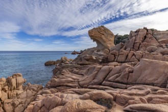 Coastal landscape with bizarre red rocks and sea view, Spiaggia di Cala E'Luas, Ogliastra,
