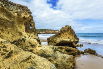 Picturesque coastal cliffs and a powerful surf of the Pacific Ocean. The Great Ocean Road of
