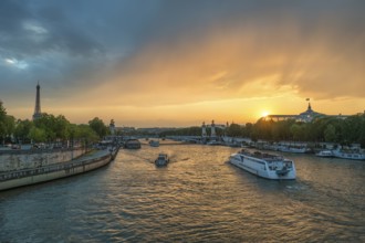 Paris France, city skyline sunset at Seine River with Pont Alexandre III bridge and Grand Palais