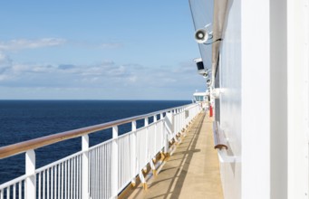 Travel with cruise ship over the blue sea with horizon as background