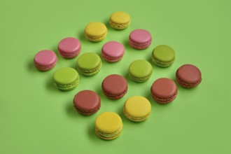 Top view of a yummy macarons or macaroons, sweet meringue-based confection with a ganache,
