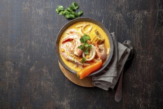 Food, Food, Peruvian seafood soup Chupe de Camarones in gray bowl, top view