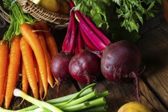 Basket with various vegetables: beetroot and carrots