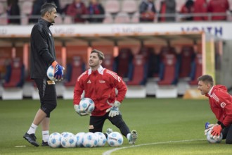 Football match, goalkeeper coach Michael Gspurning 1. FC Union Berlin left with goalkeeper Carl