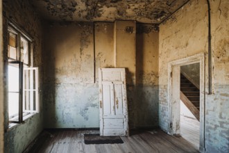 Concept photo of home renovation with old abandoned house and plenty of copyspace