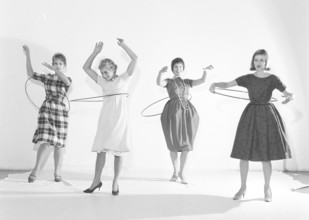 In the 1950s. Women Hula hooping. A craze that culminated during 1958 with some 20 million hula