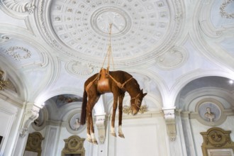 Rivoli, Italy, June 2022: Maurizio Cattelan provocative contemporary art, Novecento