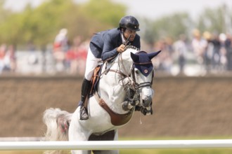 Daniel Bluman of Israel and riding Corbie V.V., compete in the 1.60m Grand Prix during The