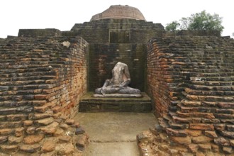 Statue of lord Buddha, Buddhist site stupa is 1400 feet-edge & 51 feet-high, Kesariya, Bihar, India