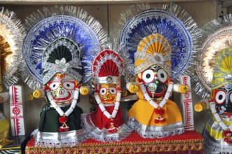 Statues of lord Jaganath, Subhadra, and Balabhadra, at Puri, Orissa, India