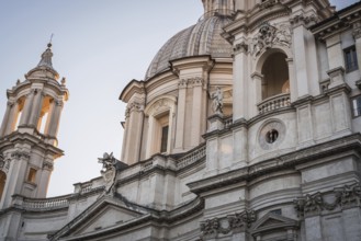 Details of the facade of the Piazza Navona building in Rome at evening