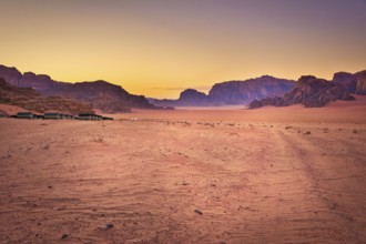 Dramatic Wadi Rum desert scene during sunset