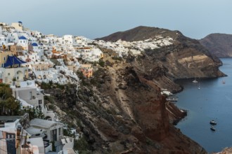 White houses on the crater rim, blue hour, Oia, Santorini, Cyclades, Greece