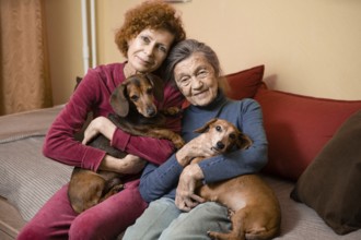 The theme is animal therapy, caring for elderly with dementia and Alzheimer's disease. Adult women