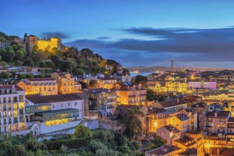 Lisbon Portugal sunset city skyline at Lisbon Baixa district and Saint George Castle