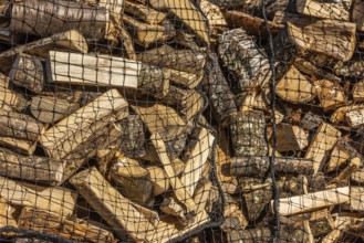 Chopped wood loaded into nets