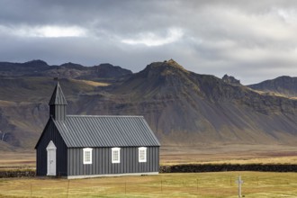 Black wooden church in Budor, Iceland