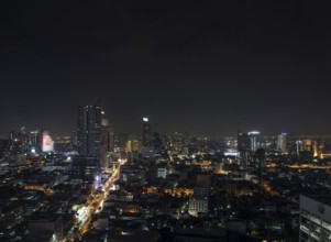 Modern buildings in silom area of central bangkok thailand at night