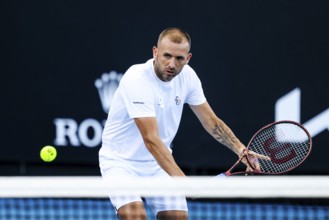 MELBOURNE, AUSTRALIA, JANUARY 11: Daniel Evans of Great Britain practices ahead of the 2024