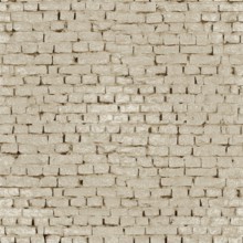 Seamless texture of an old and weathered beige brick wall, perfect for backgrounds and design