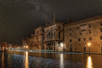 View on Canal Grande at Night, Boats passing by, Venice, Italy