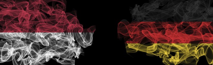 Flags of Indonesia and Germany on Black background, Indonesia vs Germany Smoke Flags