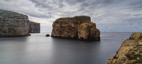 Long exposure landscape view of Dwejra Bay and Ufo Rock on Gozo Island in Malta