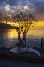 Montreux, Switzerland, October 12, 2019: Metal figure of a woman and man at promenade of Geneva