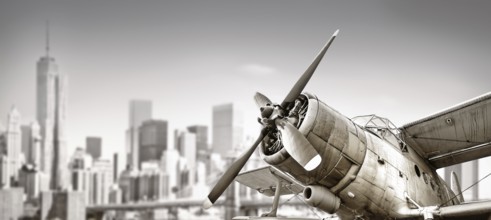 biplane against the skyline of new york