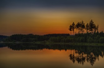 Sunset at the lake in the Harz Mountains