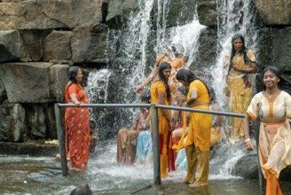 Tourists enjoying the Kodiveri waterfalls near Sathyamangalam, Tamil Nadu, South India, India, Asia