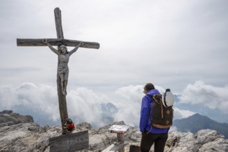 The beautiful old wooden summit cross of Mount Lagazuoi in the Dolomite Alps, autonomous province